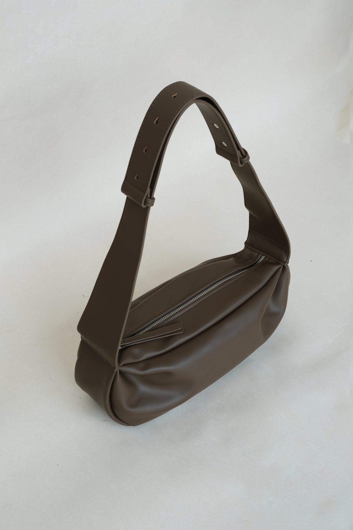 PU Soft Leather Pillow Bag in Mud Color