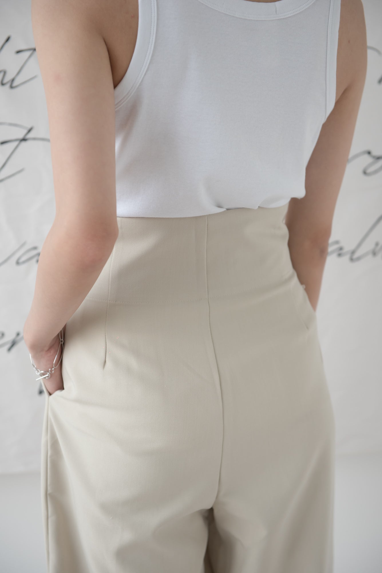 High-waisted wide-legged trousers