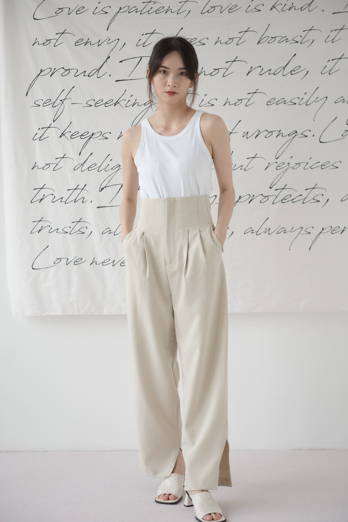 High-waisted wide-legged trousers