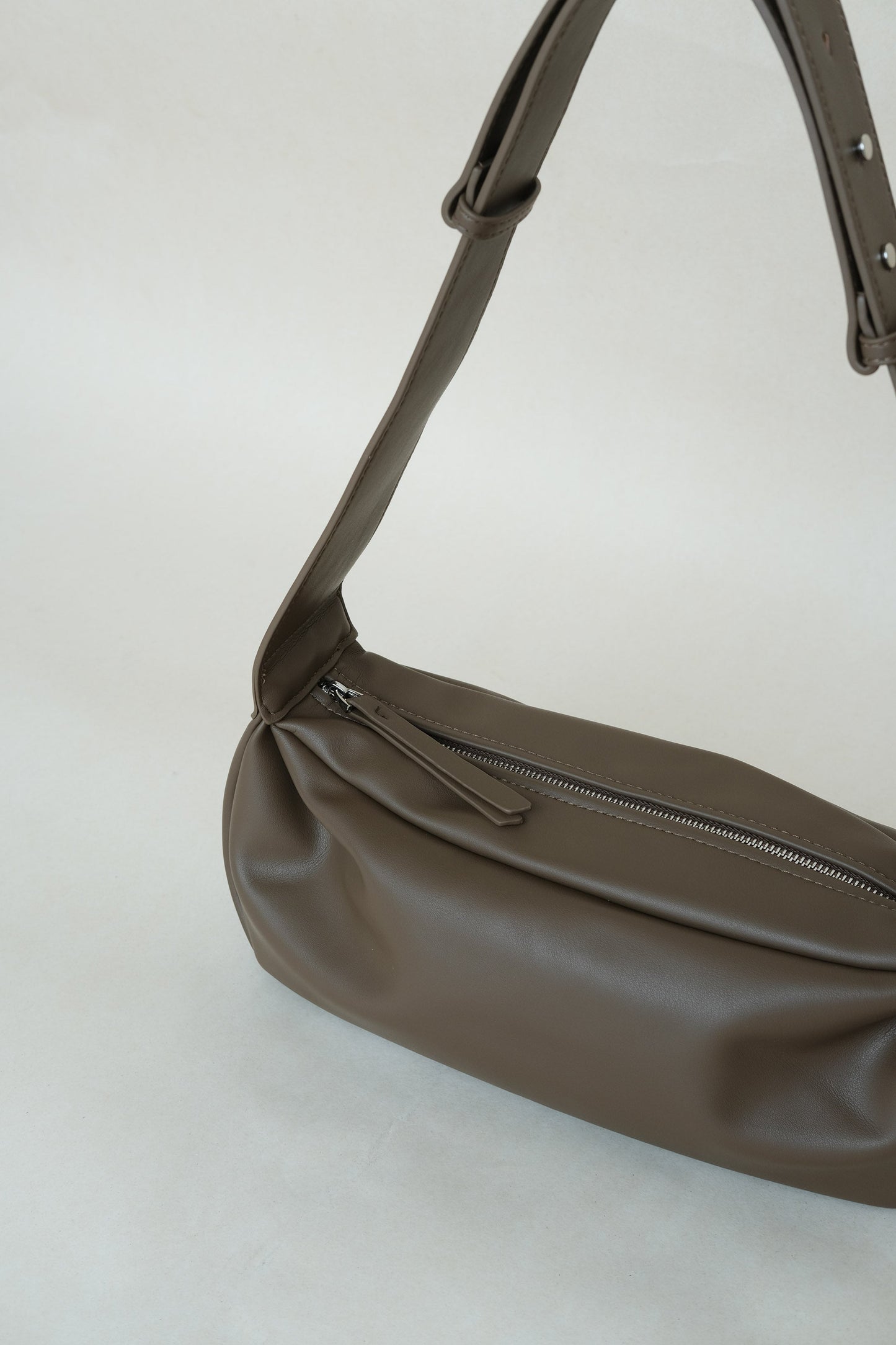 PU Soft Leather Pillow Bag in Mud Color